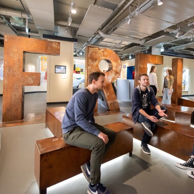 Students in the permanent exhibition
