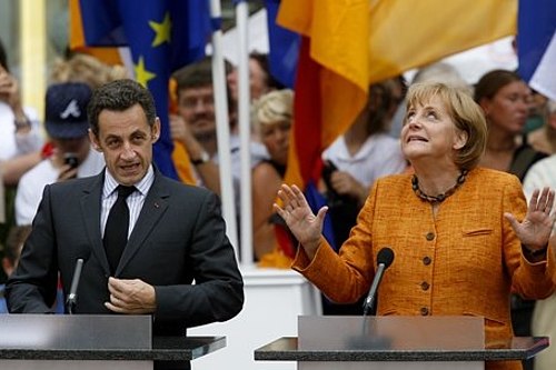 Nicolas Sarkozy und Angela Merkel, Foto: Daniel Karmann (dpa)