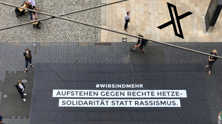 Banner mit der Aufschrift "#wirsindmehr. Aufstehen gegen rechte Hetze - Solidarität statt Rassismus."