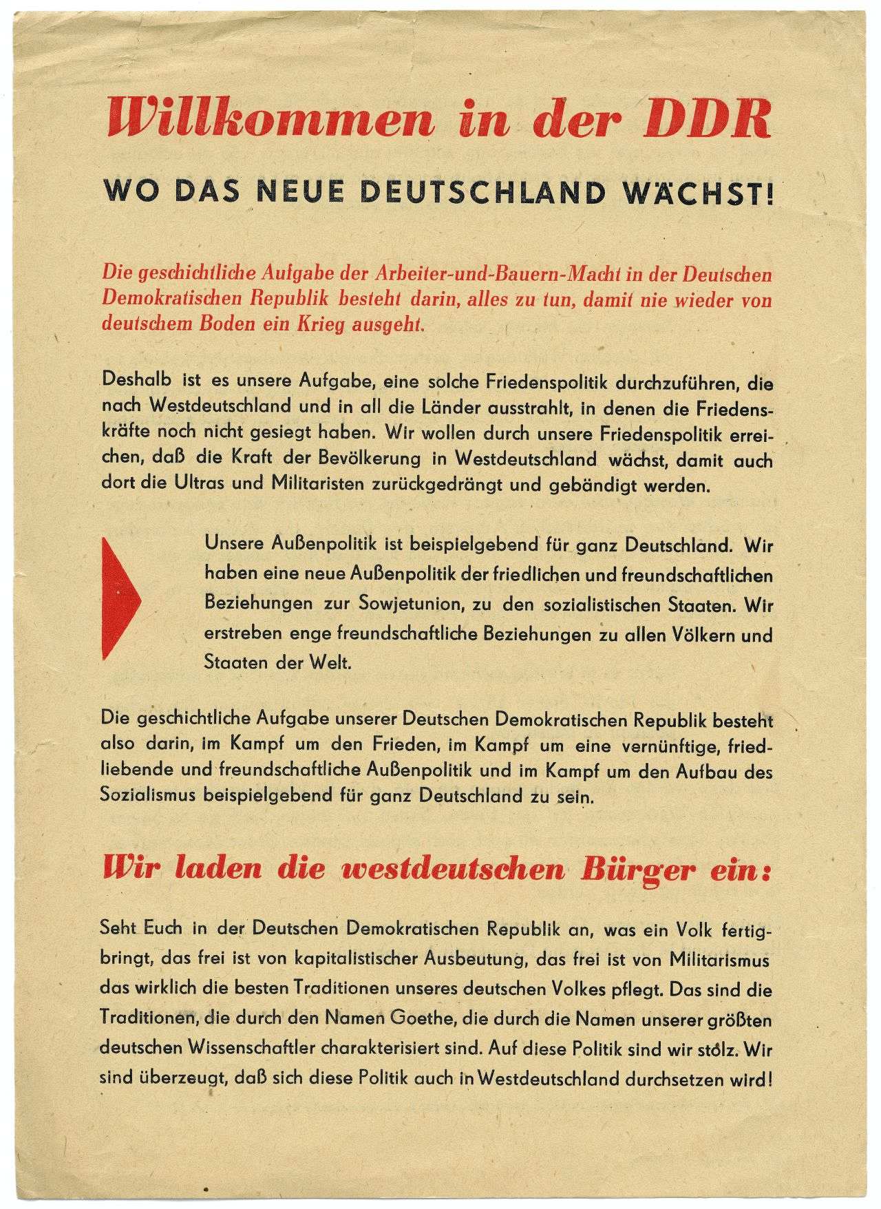Beidseitig bedrucktes, kleinformatiges Flugblatt. Oben, in rotem und schwarzem Fettdruck: Willkommen in der DDR. Wo das neue Deutschland wächst!Es folgt ein kurzer roter Vorspann und danach schwarzer Fließtext. 