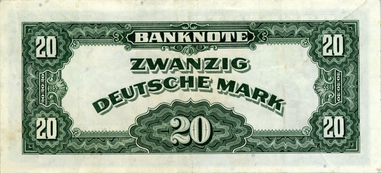 beide Seiten grün bedruckt; Vorderseite: oben weiße Aufschrift auf grünem Balken BANKNOTE, darunter doppelte rote Aufschrift J2561964C, darunter grüne Aufschrift SERIE 1948 / 20 / ZWANZIG / DEUTSCHE MARK, links allegorische Darstellung, in den Ecken Aufschrift 20.